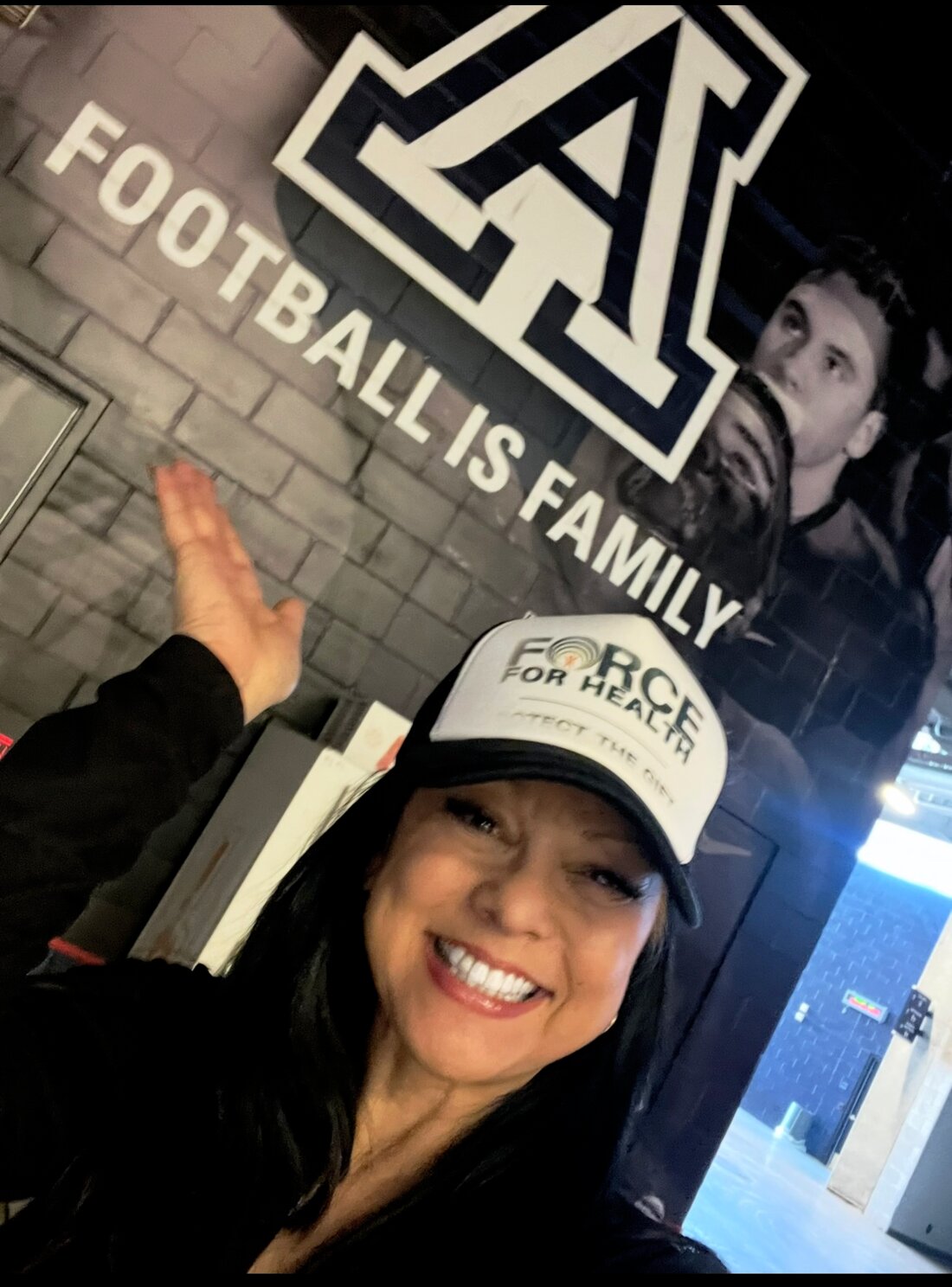 Coach Lucy Howell and her football family