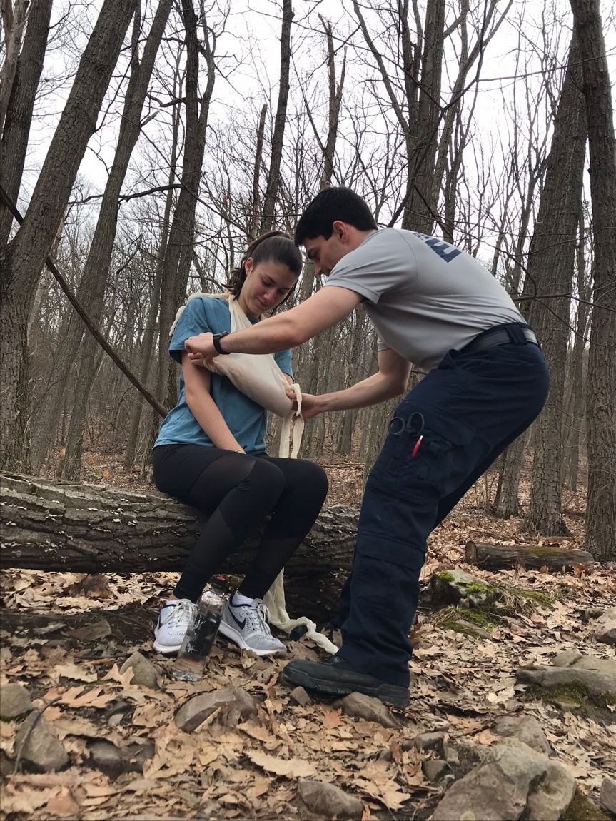 EMT Applying Tourniquet