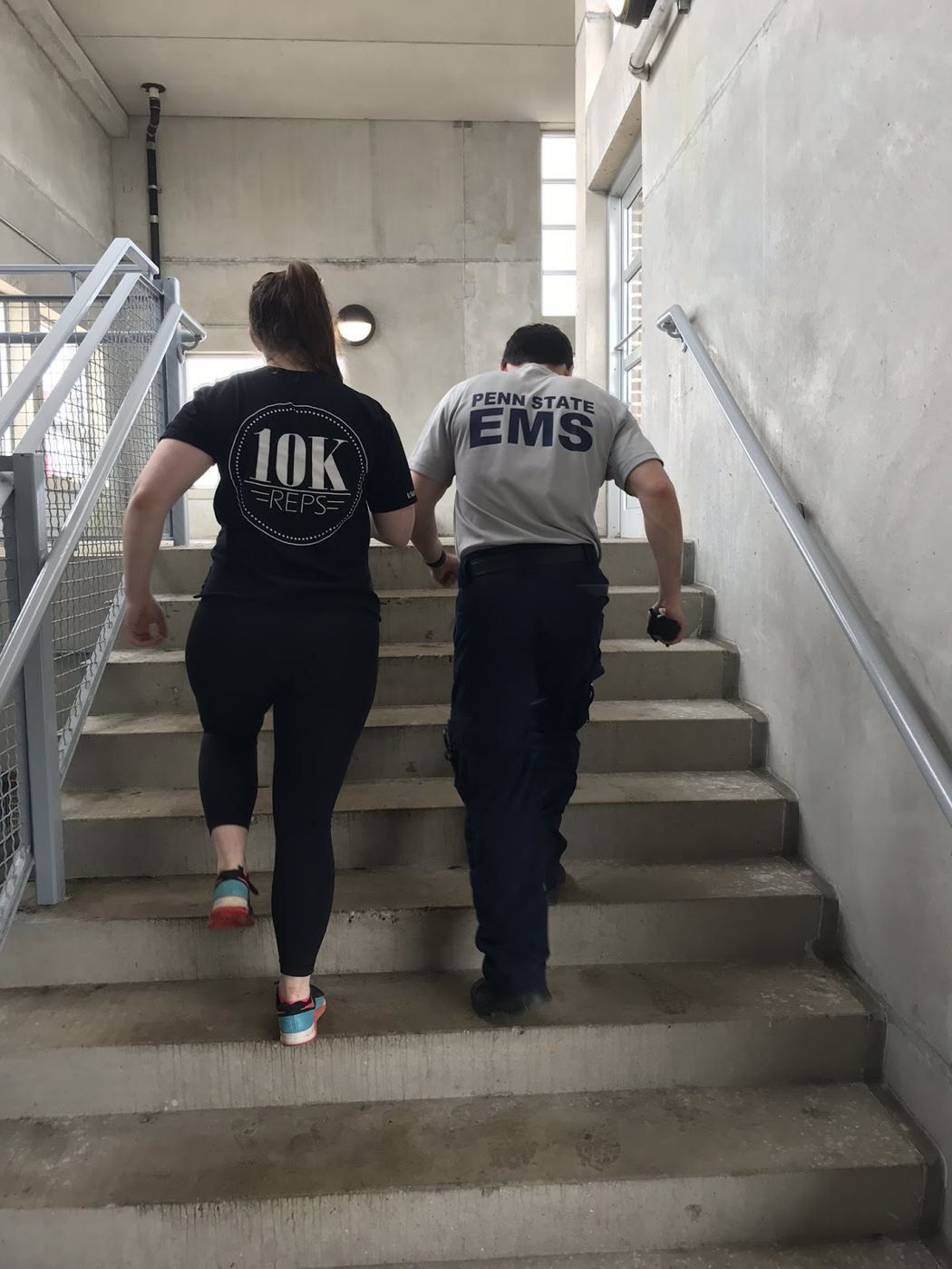EMT and Civilian Racing up Stairs