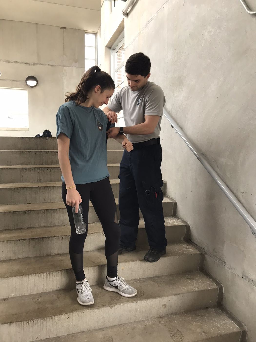 EMT Applying Sling and Swathe